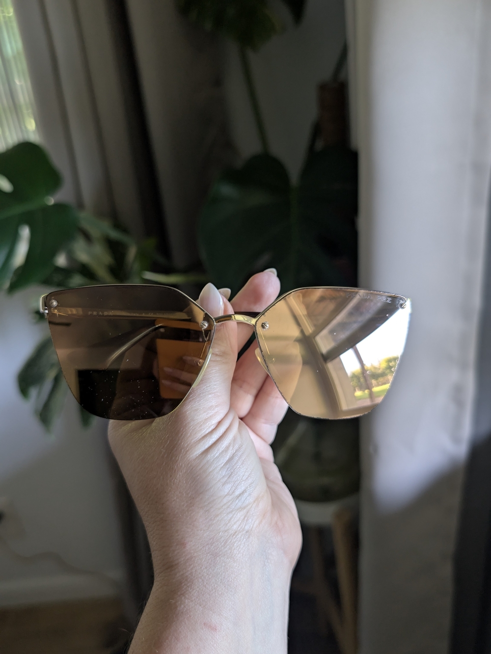 Prada Rimless Cat-Eye Sunglasses in Brown and Gold